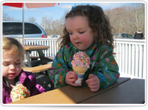 little girl enjoying ice cream at Good Days Restaurant